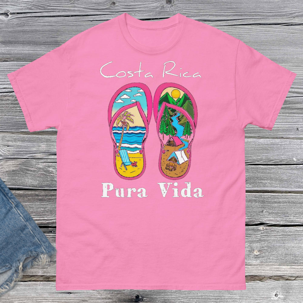 Product mProduct m"Unisex classic fit t-shirt featuring a vibrant collage-style design that celebrates Costa Rica, including tropical elements like toucans, sloths, beaches, waves, and jungle foliage. The colorful graphic is set against a neutral shirt color, capturing the laid-back and adventurous spirit of Pura Vida."ockup