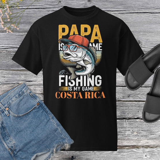 👉 "Unisex t-shirt featuring a 'Fishing Is My Game CR®' graphic, with a marlin and fishing theme – perfect for Costa Rica’s sport fishing enthusiasts."