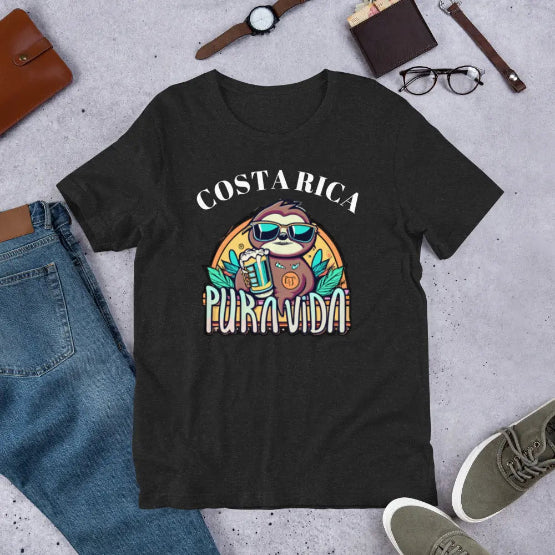 👉 "Unisex t-shirt with a playful sloth graphic and 'Pura Vida' slogan, capturing the relaxed spirit of Costa Rica’s rainforests and wildlife."